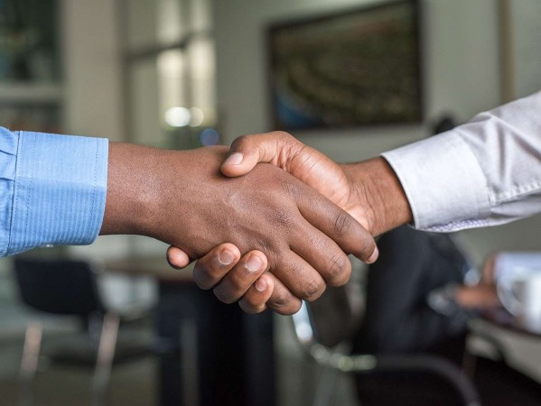 two men shaking hands