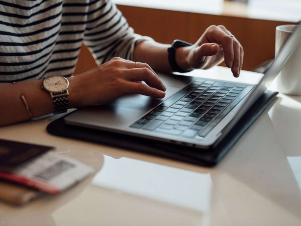 person using laptop person using laptop